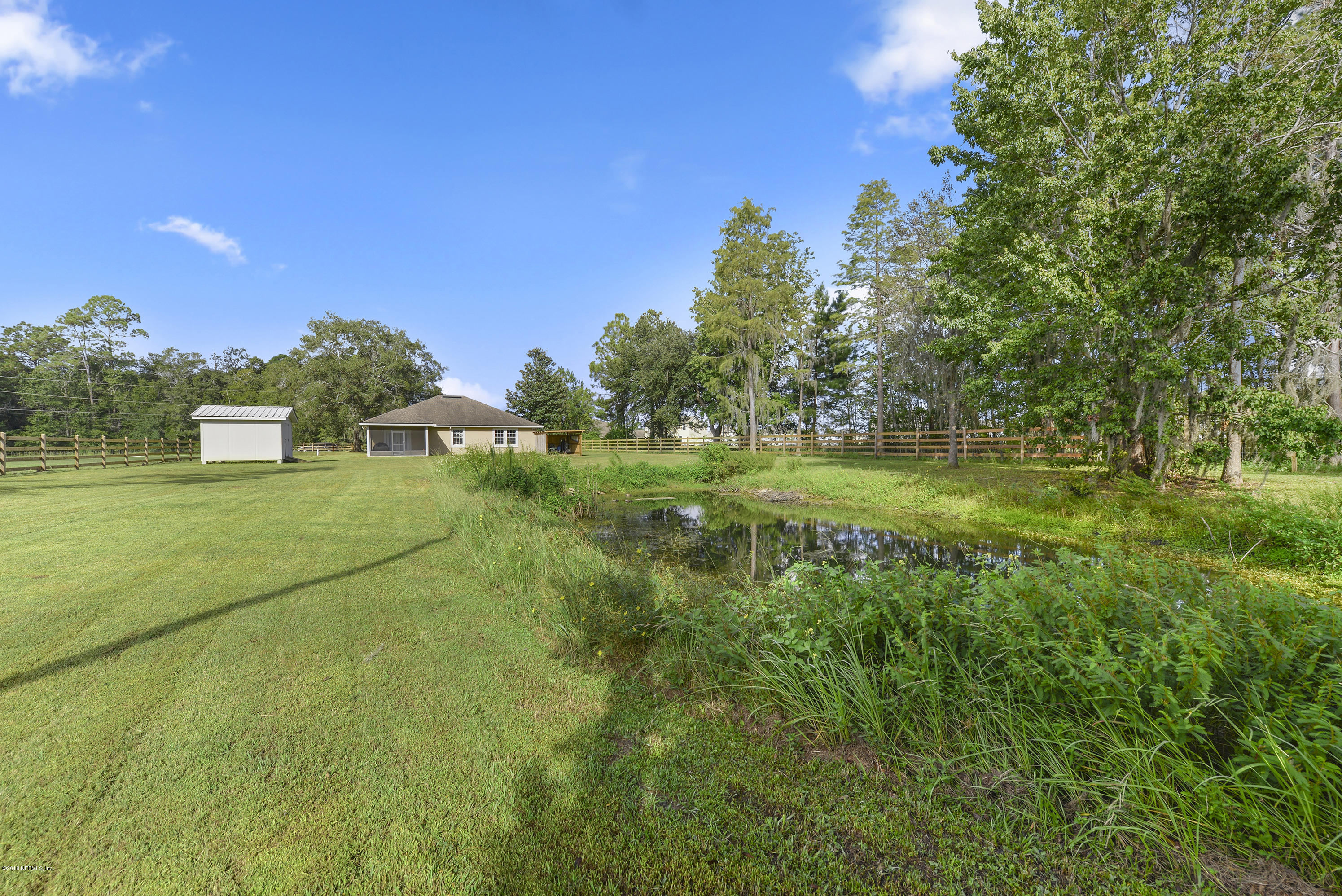 1770 Perry Road Green Cove Springs, FL 32043 - Photo 24 of 25 back yard pond