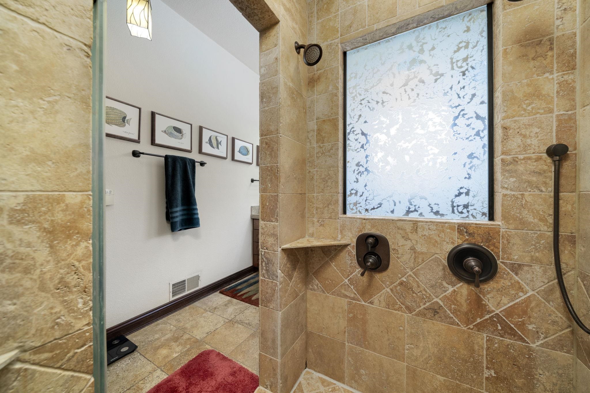 6871 Montague Road Rockford, IL 61102 - Photo 23 of 77 a view of a bathroom with a shower