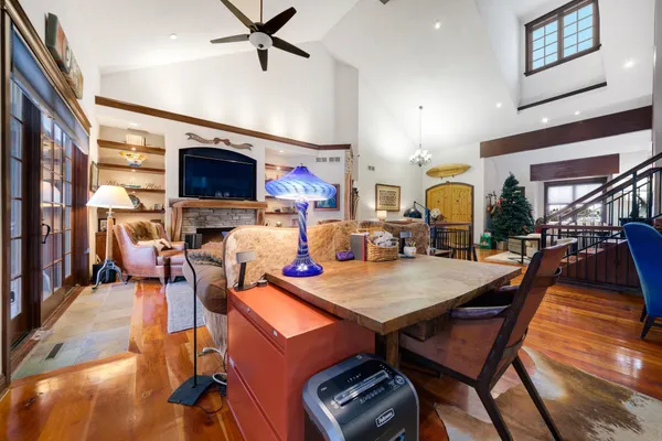 a dining room with a table and chairs
