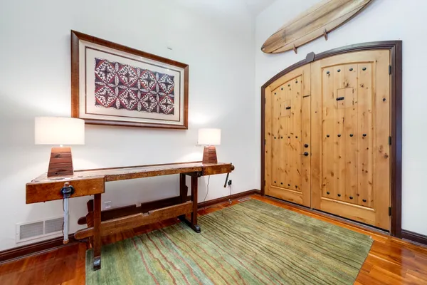 a view of a house with mountain and sitting area