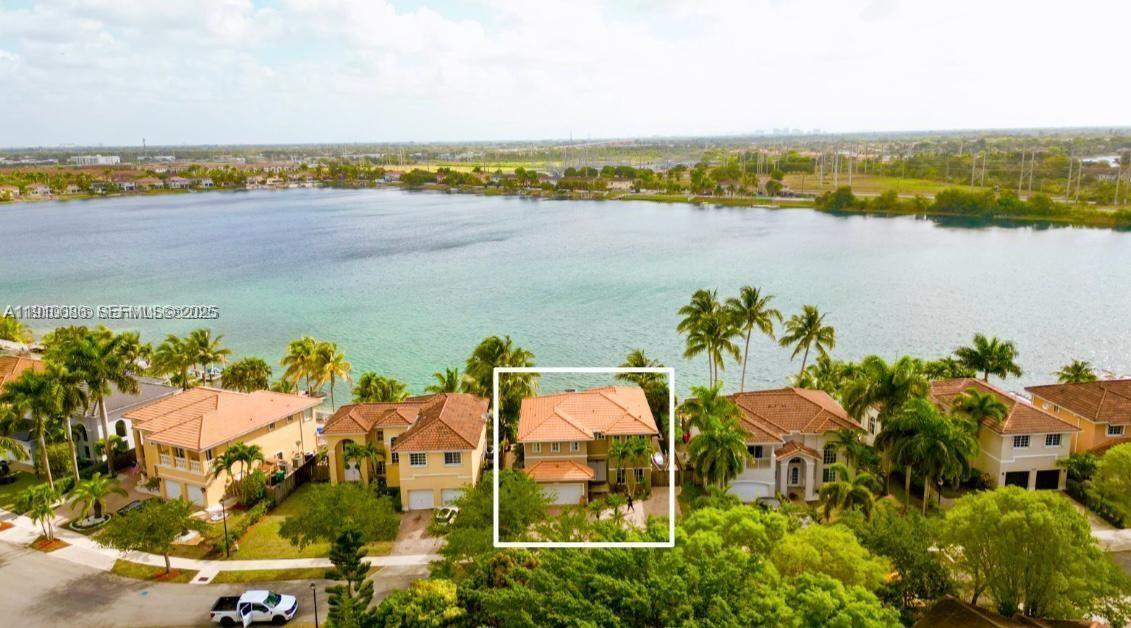 14241 Southwest 129th Avenue Miami, FL 33186 - Photo 2 of 24 a view of a city and lake view