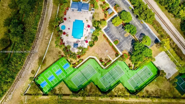 a view of a swimming pool with a patio