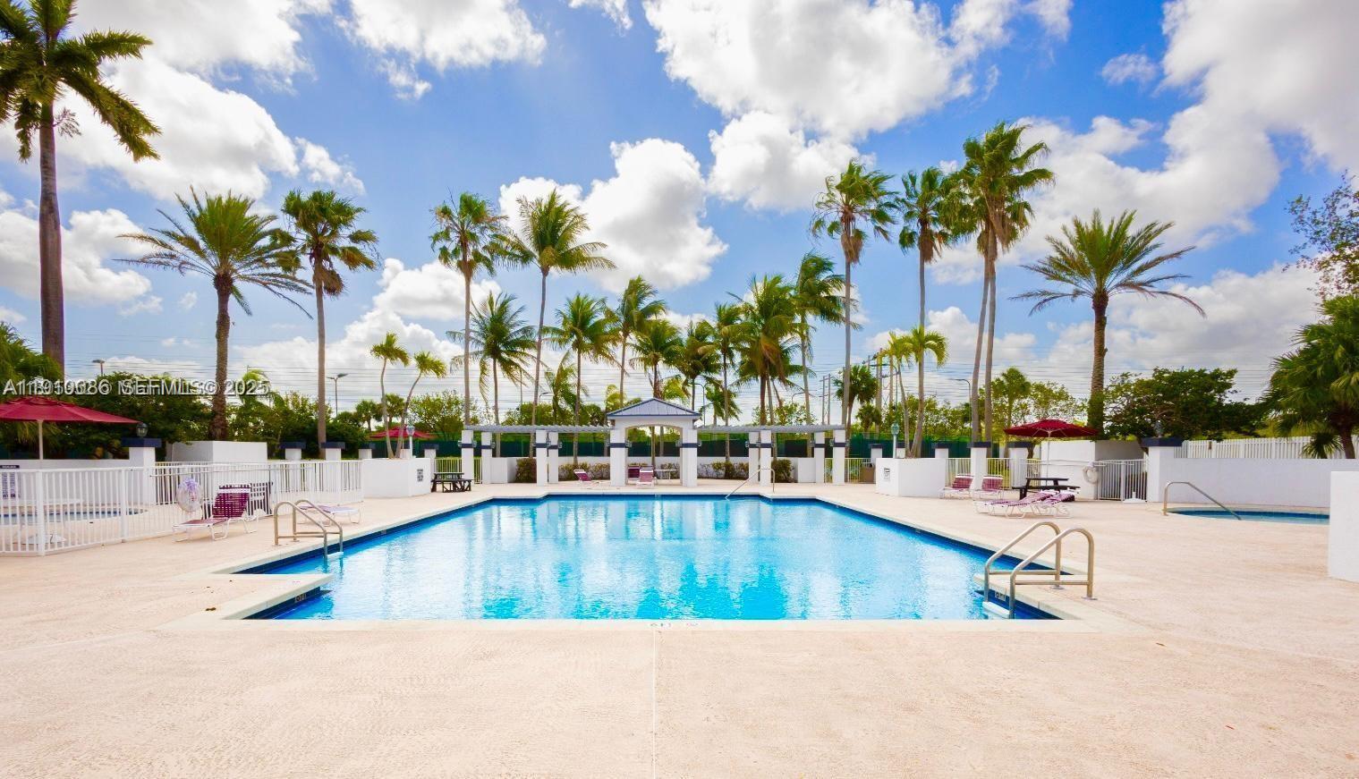 14241 Southwest 129th Avenue Miami, FL 33186 - Photo 23 of 24 a view of swimming pool with outdoor seating