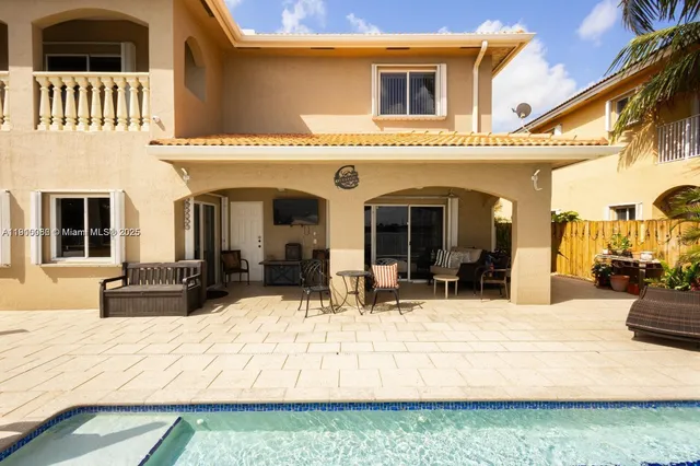 a house view with a outdoor space
