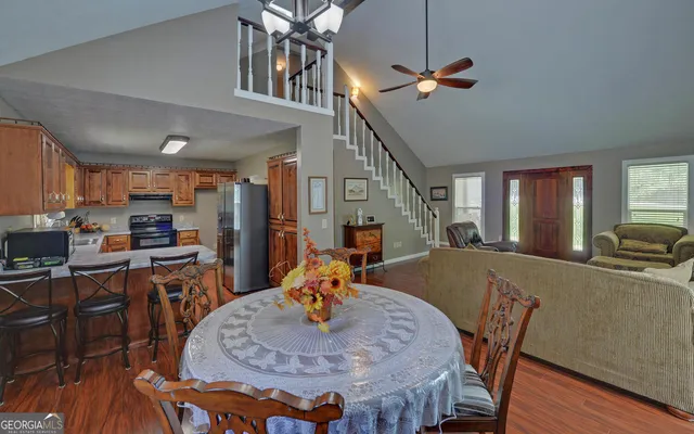 a view of a dining room with furniture