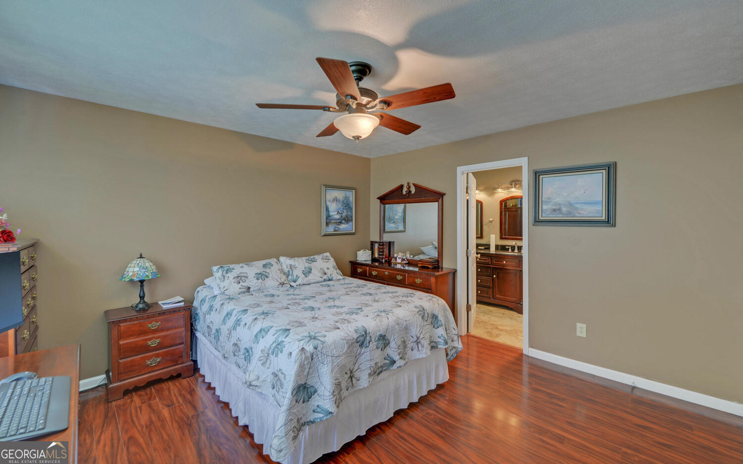 46 Cedar Ridge Drive Toccoa, GA 30577 - Photo 17 of 48 a bedroom with a bed and wooden floor