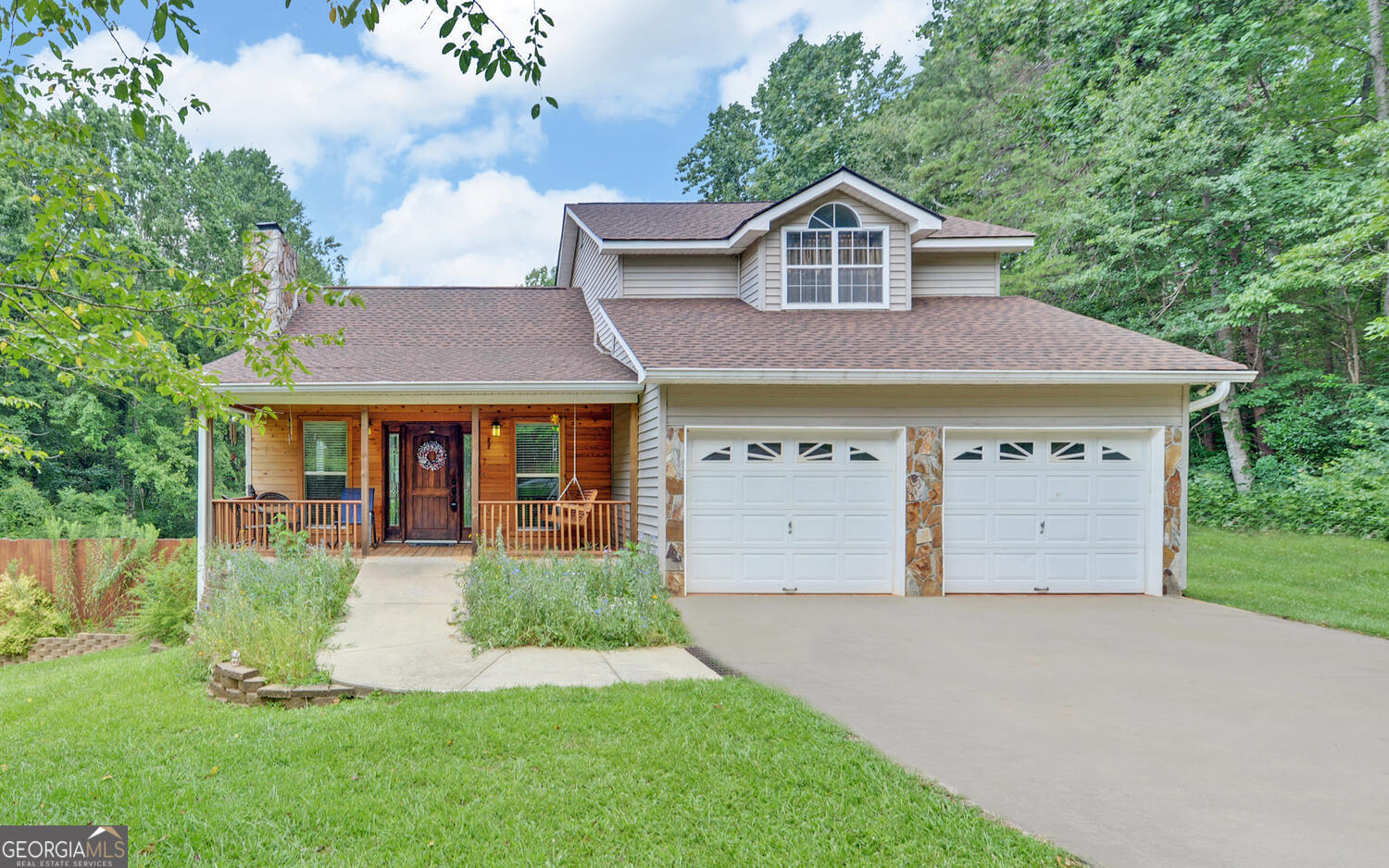 46 Cedar Ridge Drive Toccoa, GA 30577 - Photo 3 of 48 a front view of a house with a yard and garage