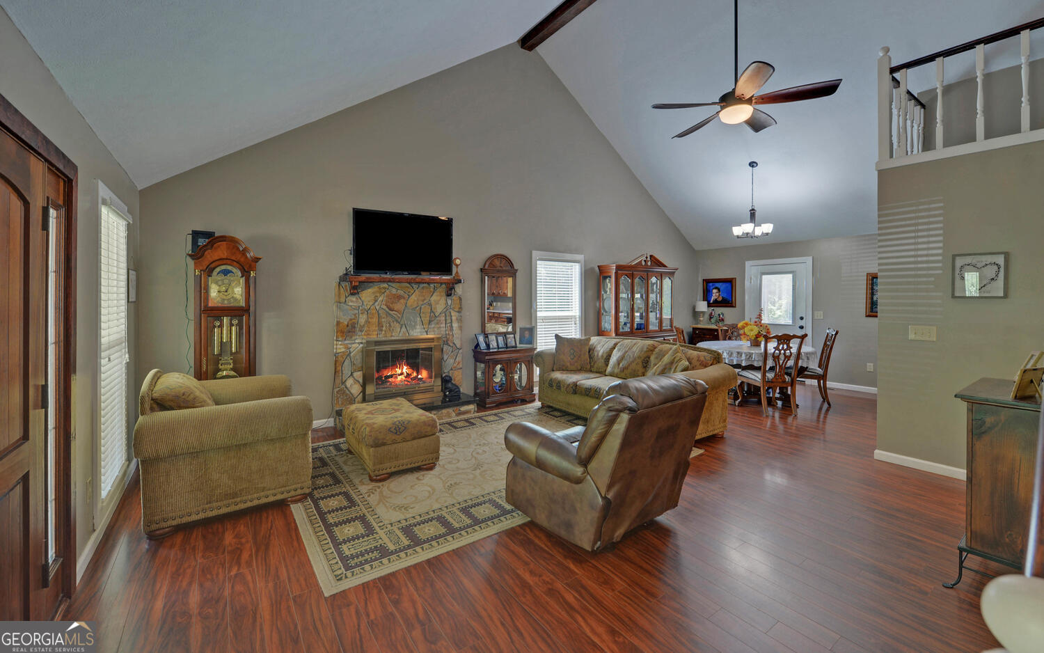 46 Cedar Ridge Drive Toccoa, GA 30577 - Photo 6 of 48 a living room with furniture wooden floor and a fireplace