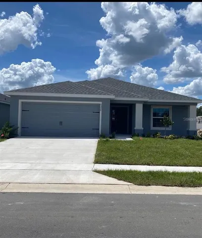 a view of a house with a garden