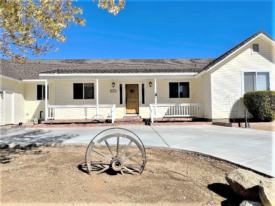 21209 Ridgeway Drive Tehachapi, CA 93561 - Photo 3 of 50 a house view with a outdoor space