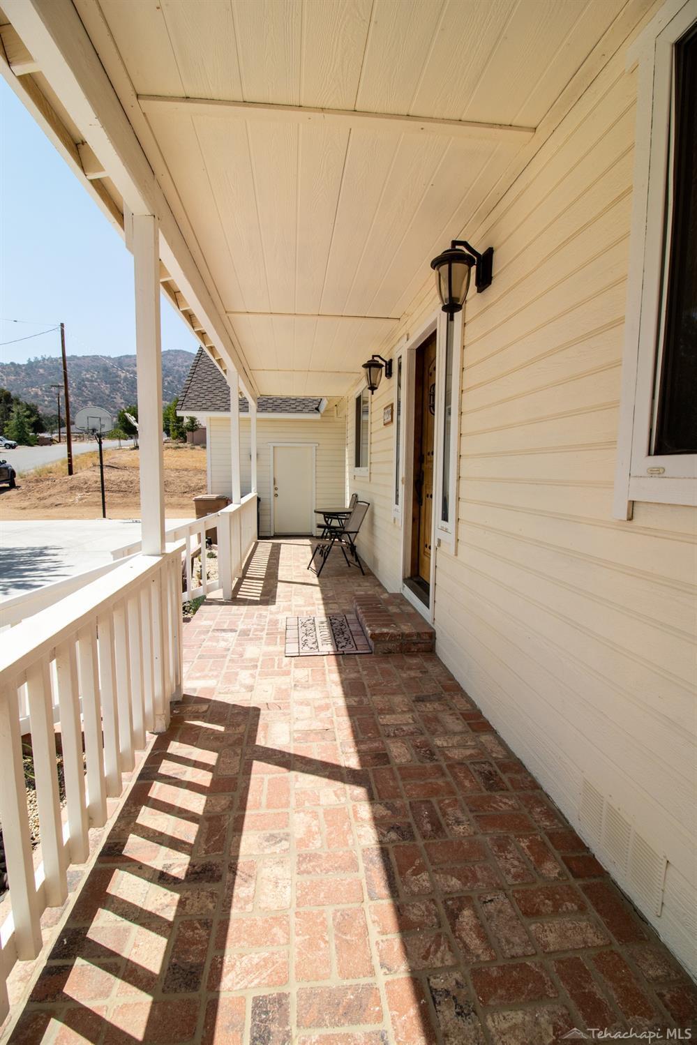21209 Ridgeway Drive Tehachapi, CA 93561 - Photo 47 of 50 a narrow alley way with furniture