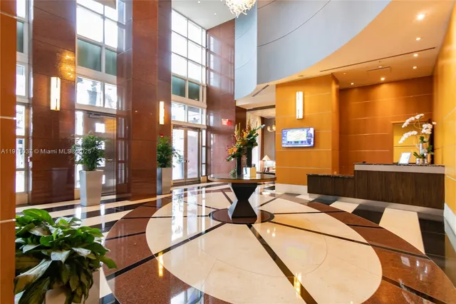 a view of a patio with a table and chairs