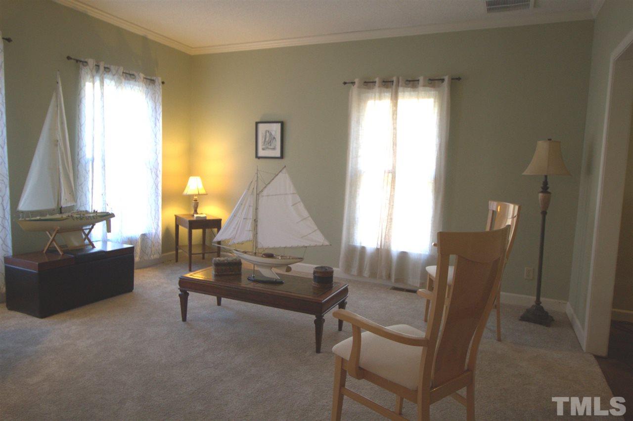 2407 Mt Vernon Church Road Raleigh, NC 27614 - Photo 3 of 29 a living room with furniture and a window