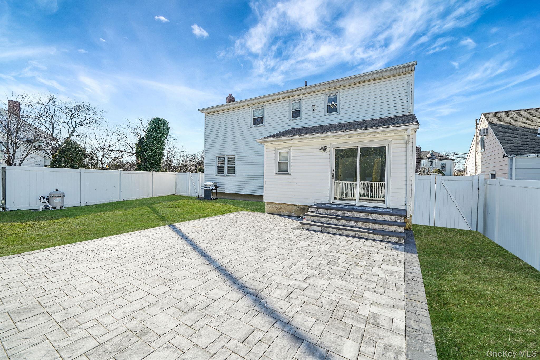 2415 Babylon Turnpike Merrick, NY 11566 - Photo 24 of 32 a view of back yard of the house