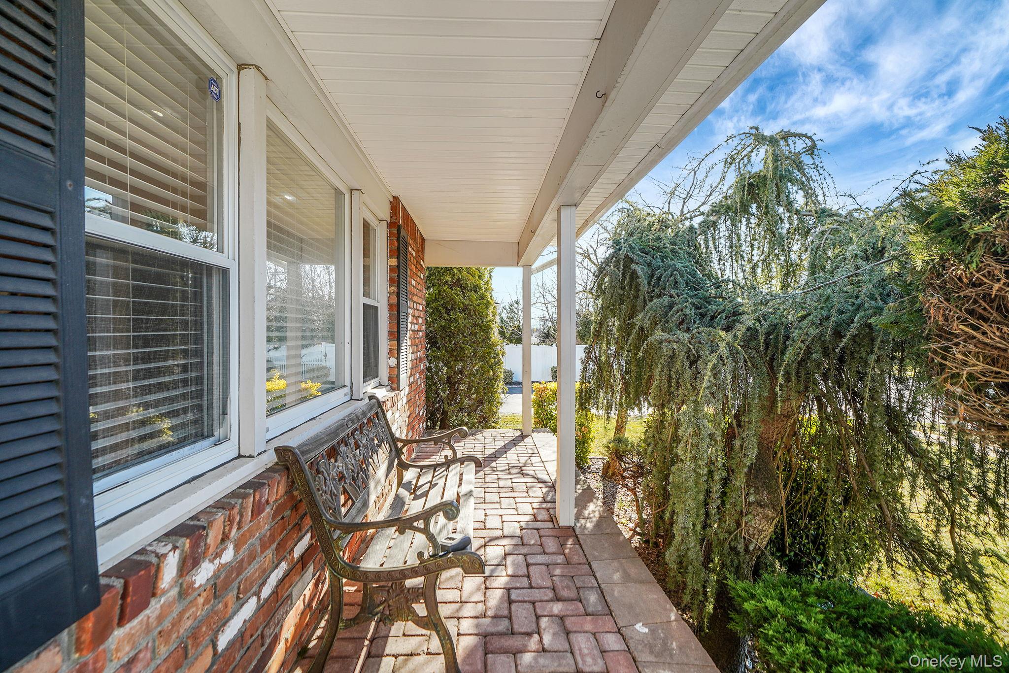 2415 Babylon Turnpike Merrick, NY 11566 - Photo 27 of 32 a view of balcony with wooden floor