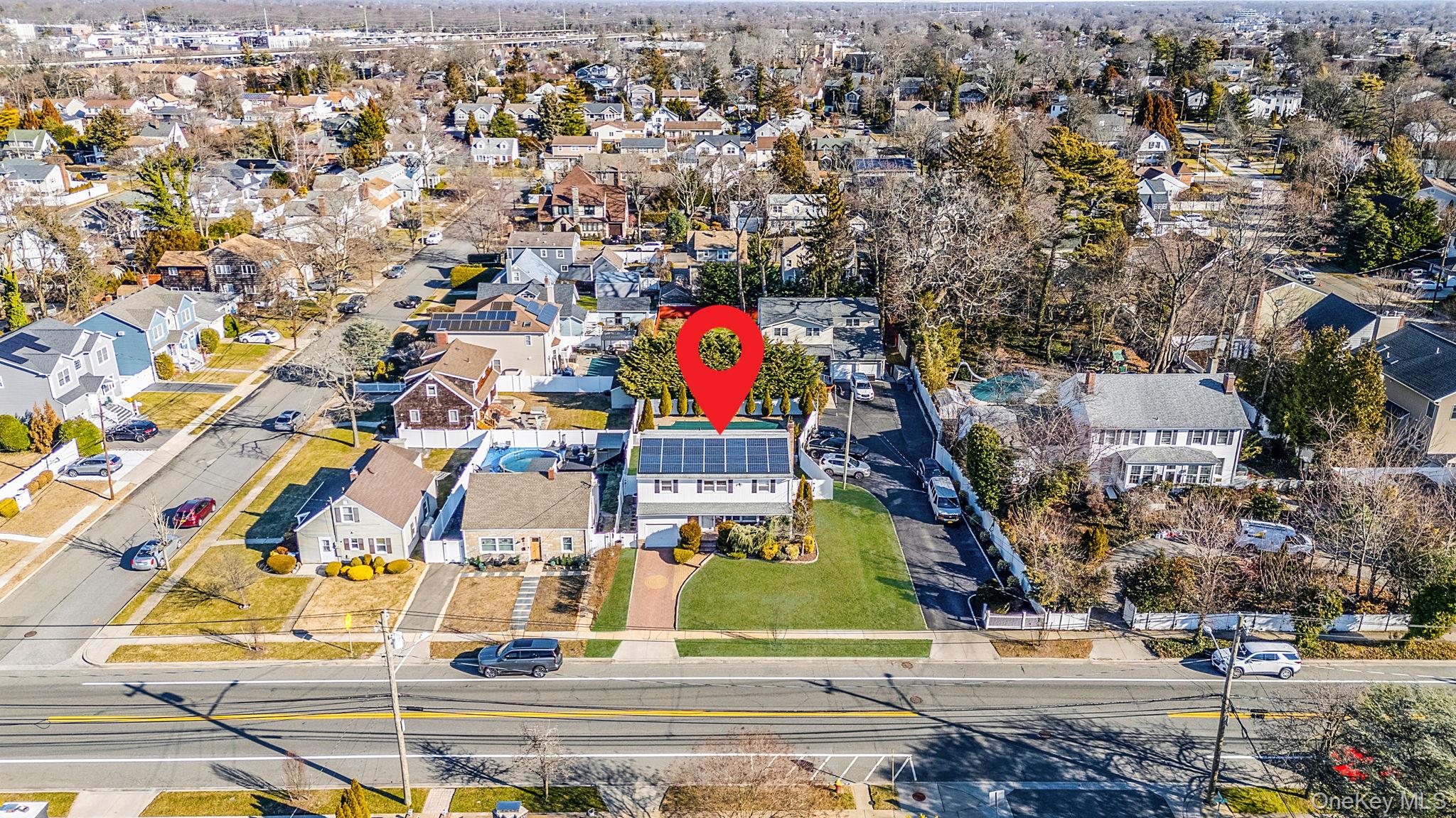 2415 Babylon Turnpike Merrick, NY 11566 - Photo 28 of 32 an aerial view of residential houses with outdoor space