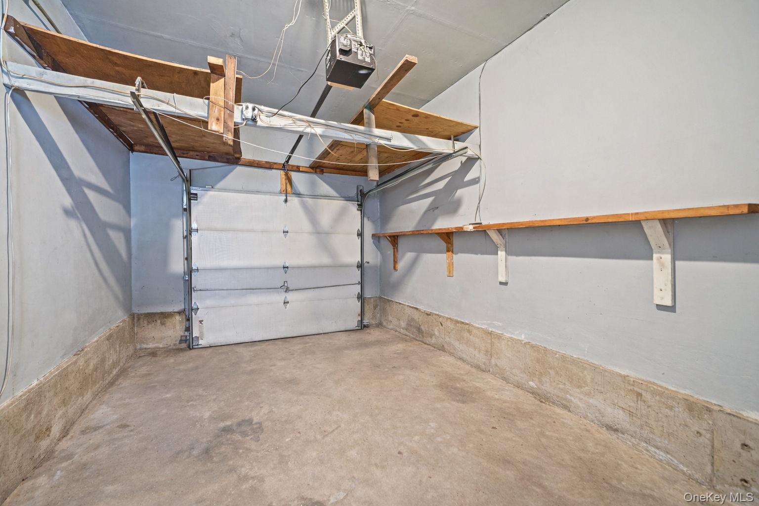 2415 Babylon Turnpike Merrick, NY 11566 - Photo 30 of 32 a view of an empty room with racks on the wall