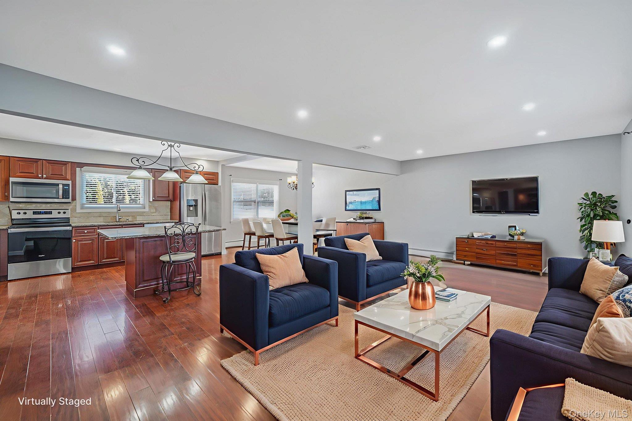 2415 Babylon Turnpike Merrick, NY 11566 - Photo 5 of 32 a living room with fireplace furniture and a flat screen tv