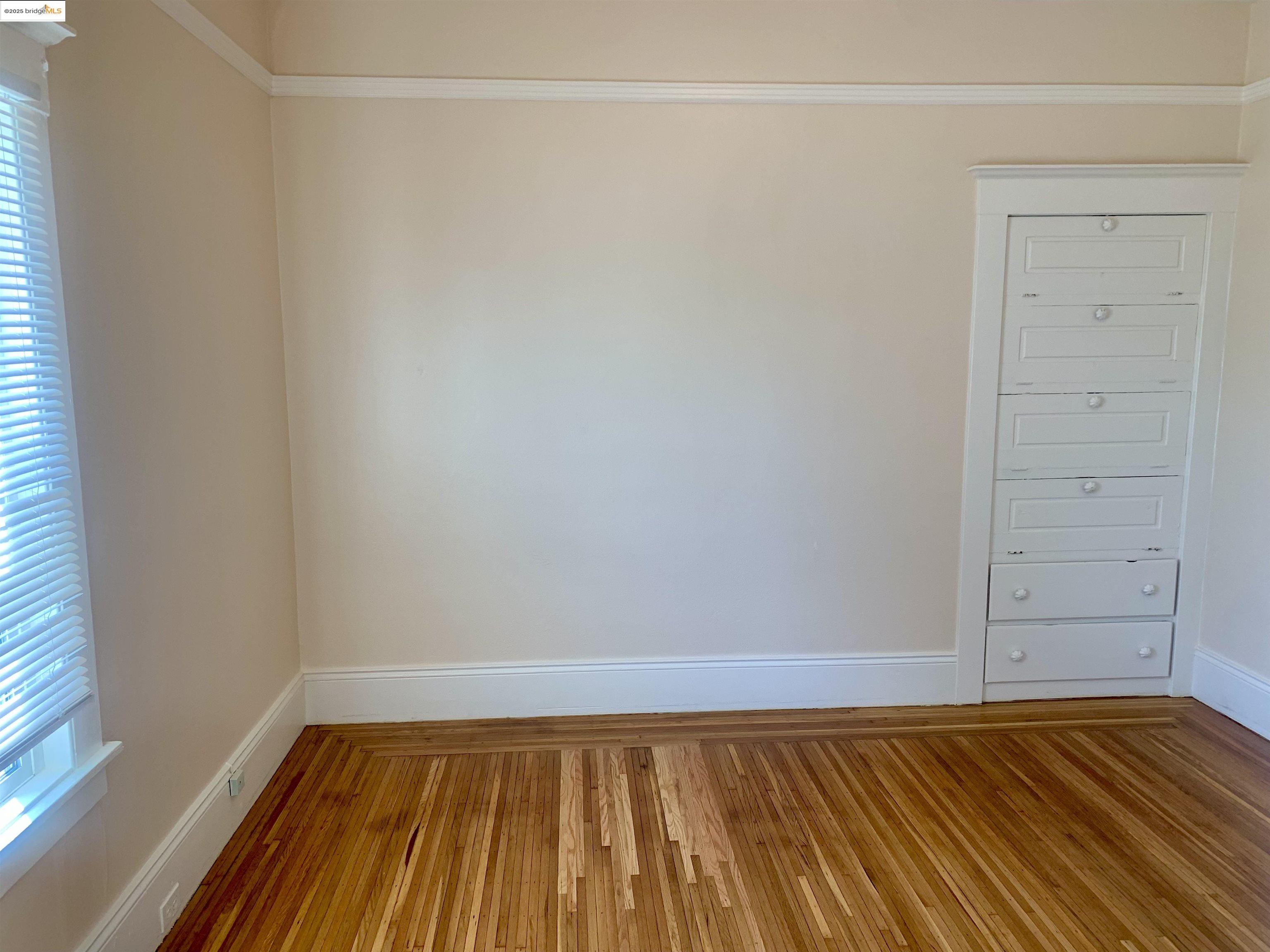 1028 61st Street Oakland, CA 94608 - Photo 11 of 28 a view of room with walk in closet