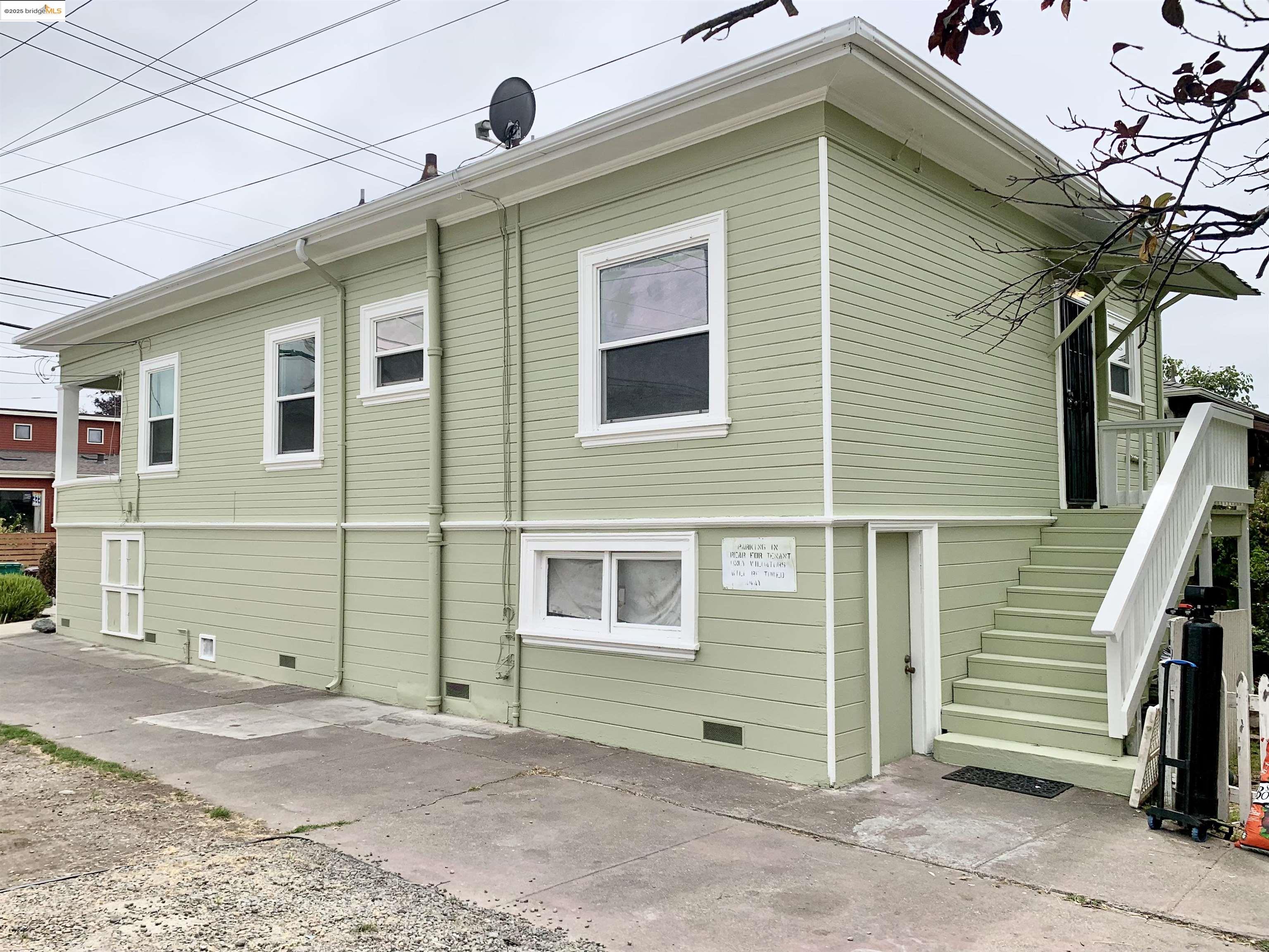 1028 61st Street Oakland, CA 94608 - Photo 26 of 28 a front view of a house