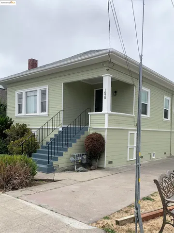 a house view with a outdoor space
