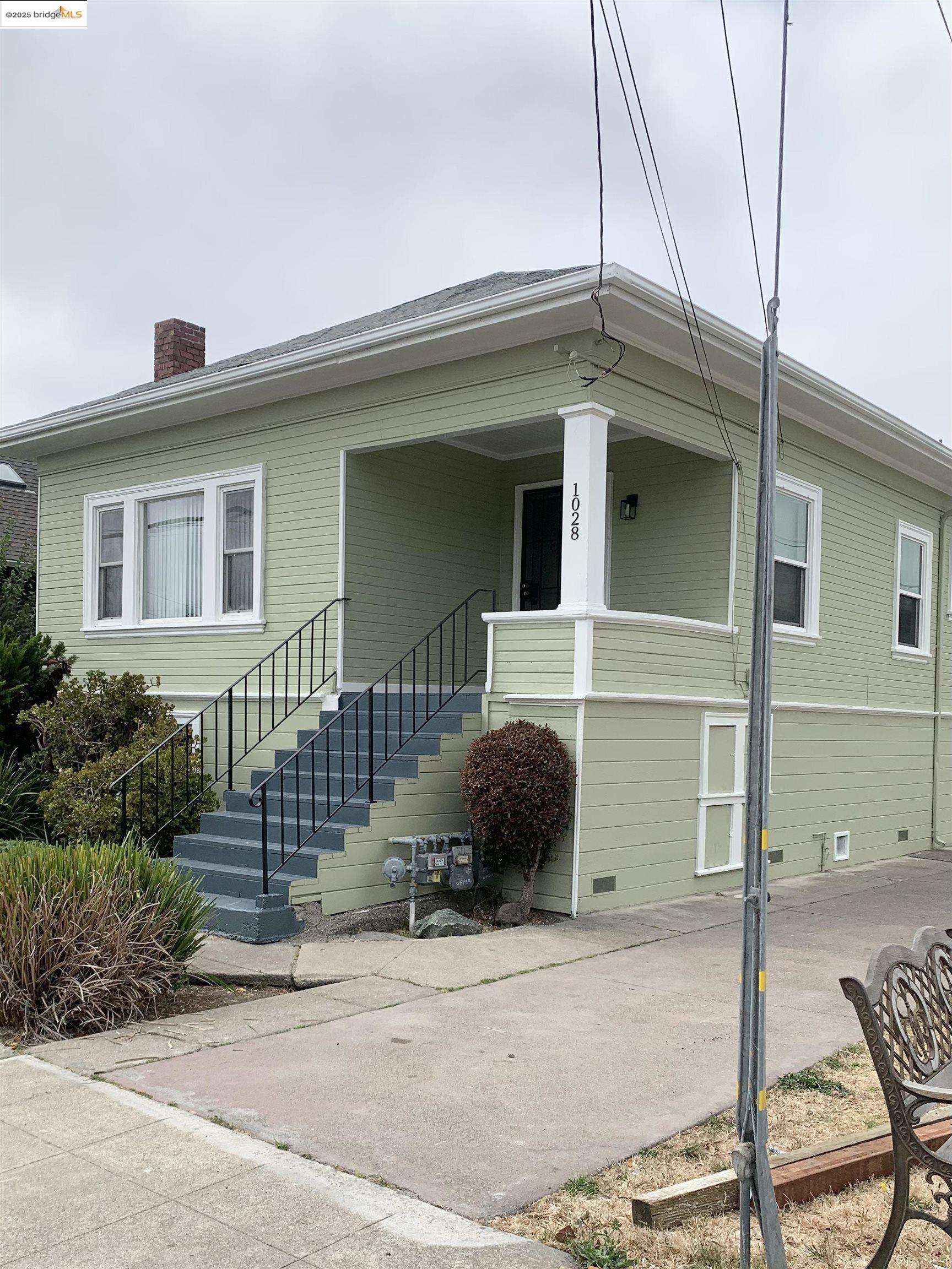 1028 61st Street Oakland, CA 94608 - Photo 3 of 28 a house view with a outdoor space