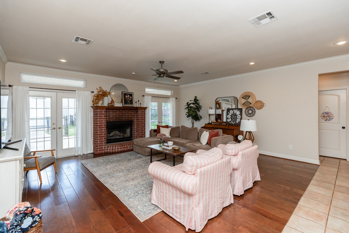 430 Bonura Road Sour Lake, TX 77659 - Photo 19 of 50 a living room with furniture large window and wooden floor