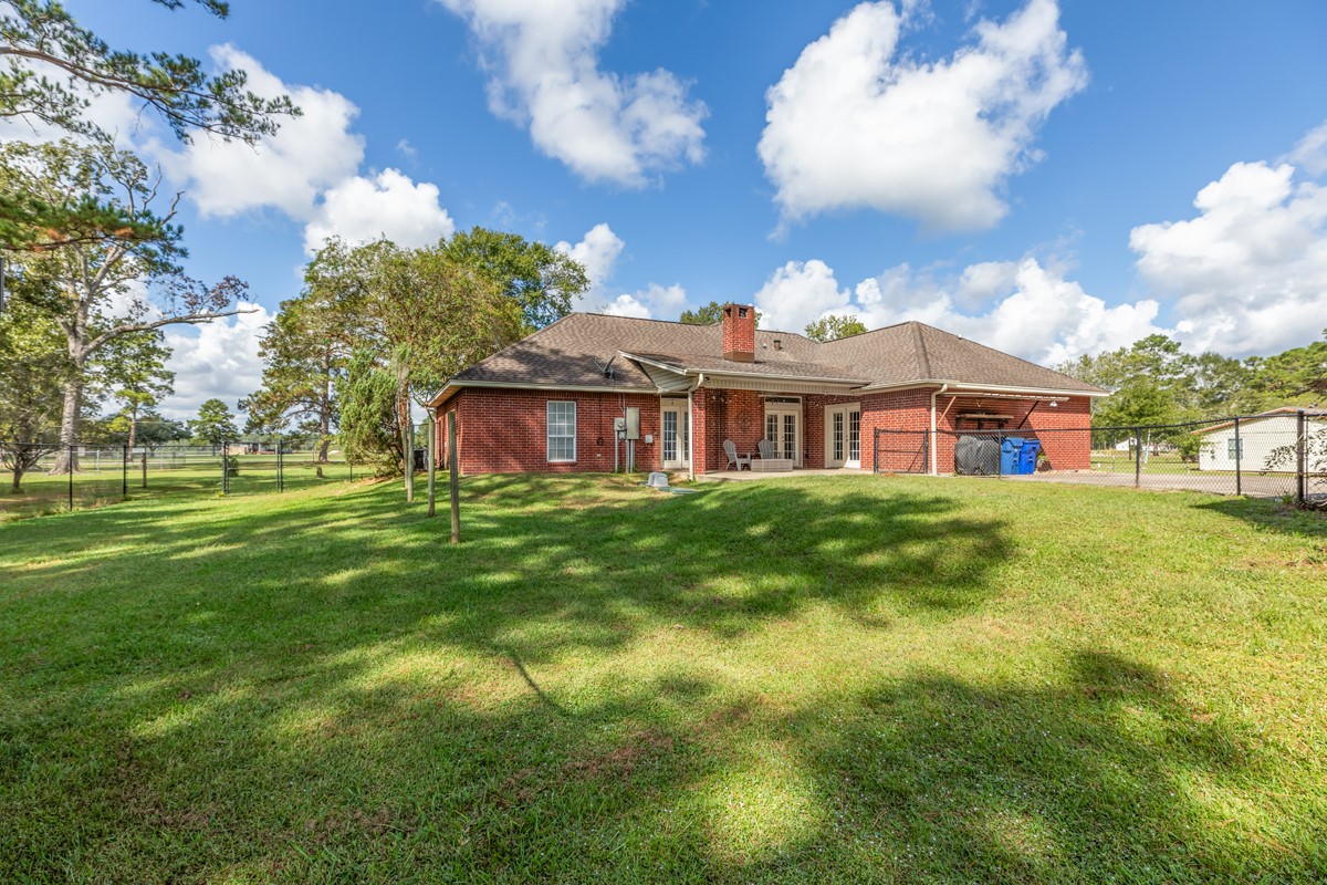 430 Bonura Road Sour Lake, TX 77659 - Photo 41 of 50 a front view of house with yard and green space