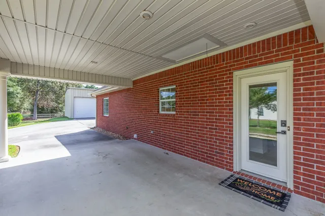 a house with trees in front of it