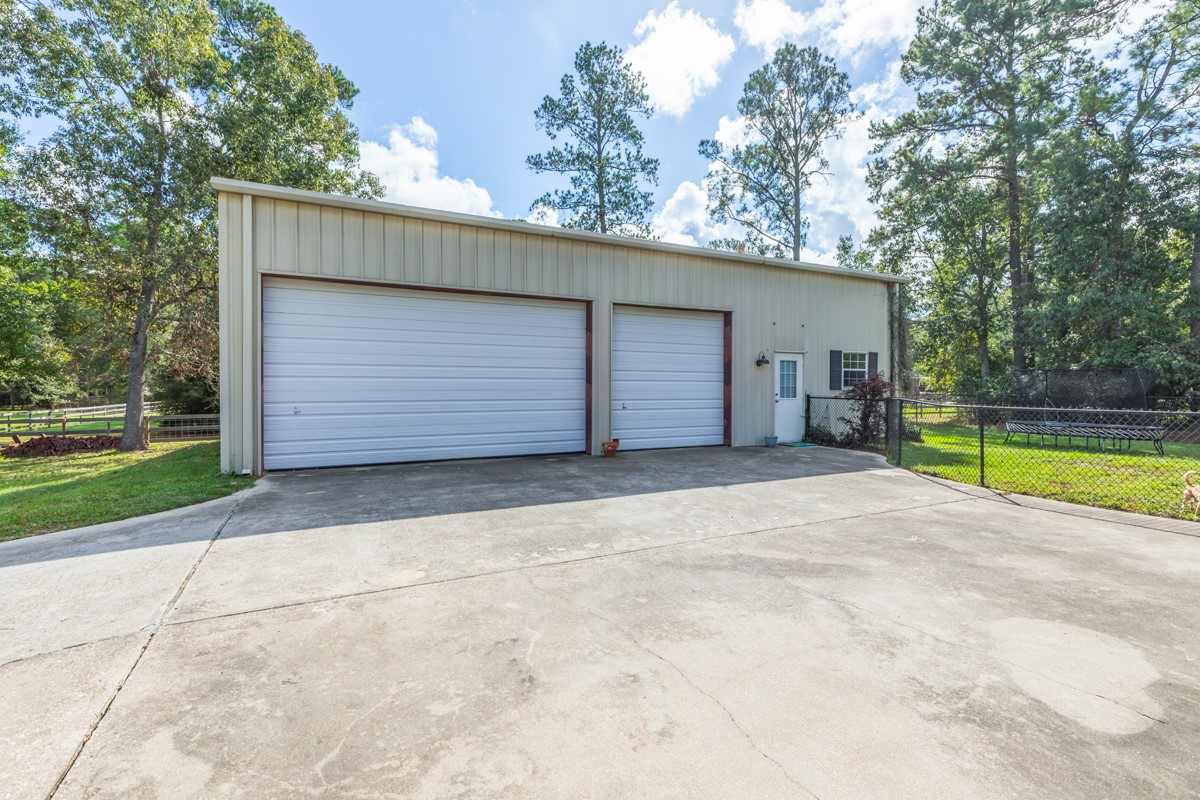 430 Bonura Road Sour Lake, TX 77659 - Photo 44 of 50 a view of a yard with garage