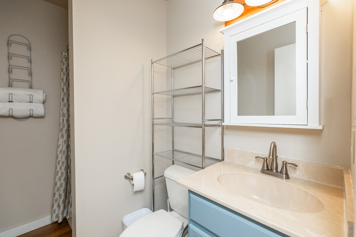 430 Bonura Road Sour Lake, TX 77659 - Photo 48 of 50 a bathroom with a sink toilet vanity and shower