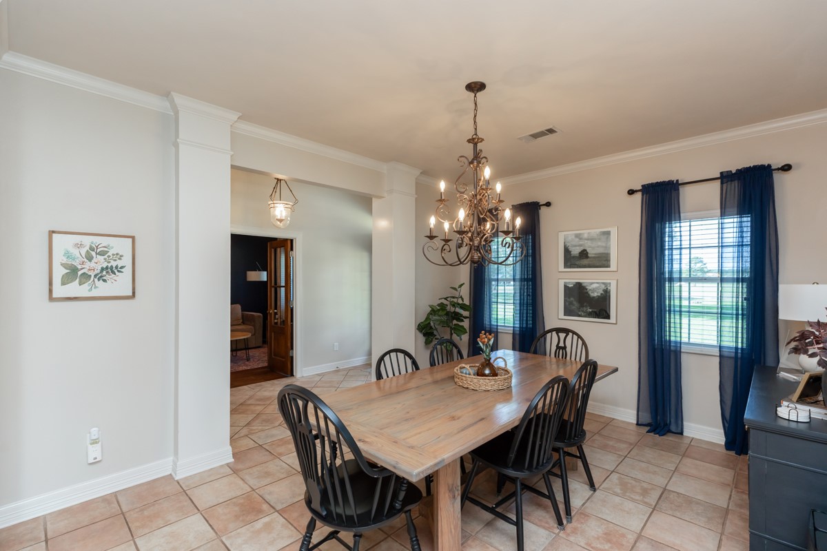 430 Bonura Road Sour Lake, TX 77659 - Photo 9 of 50 a view of a dining room with furniture and window