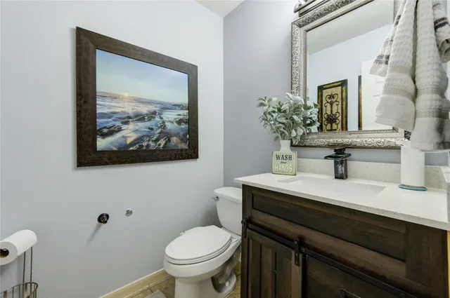 a bathroom with a sink and a toilet