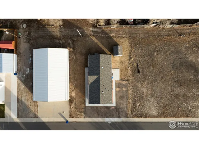 a view of a livingroom with furniture and window