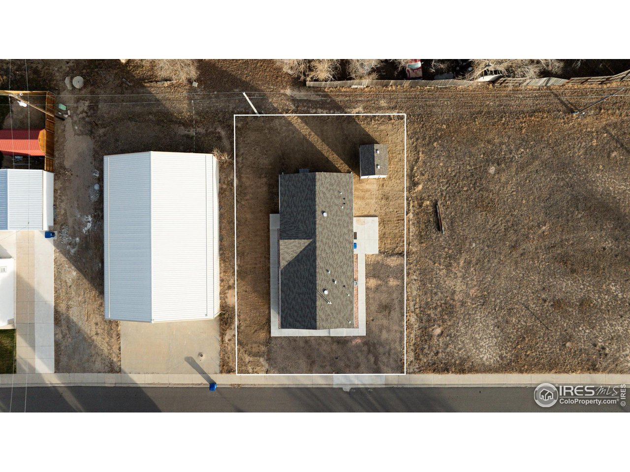 116 Ash Street Log Lane Village, CO 80705 - Photo 2 of 21 a black and white photo of a living room