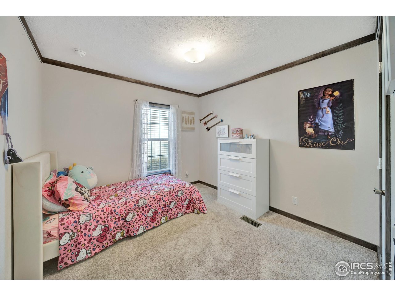 116 Ash Street Log Lane Village, CO 80705 - Photo 6 of 21 a bedroom with a bed and a window