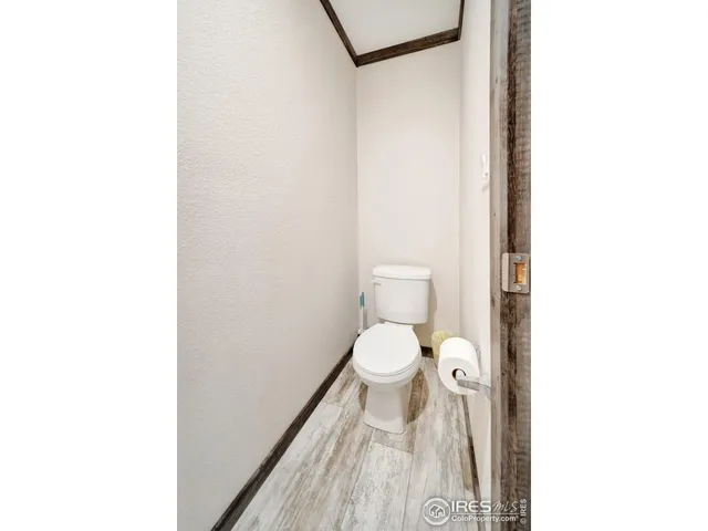 a bathroom with a double vanity sink a mirror and a shower