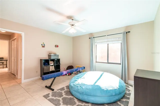 a room with furniture and a window