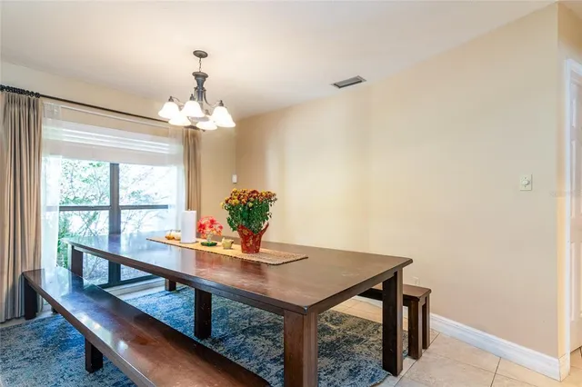 a view of a room with furniture and a potted plant