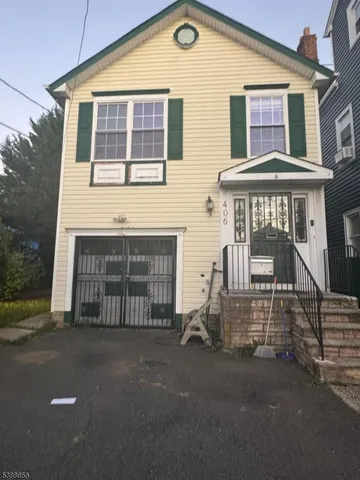 front view of a house with a street