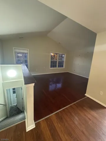 a view of livingroom and hardwood floor
