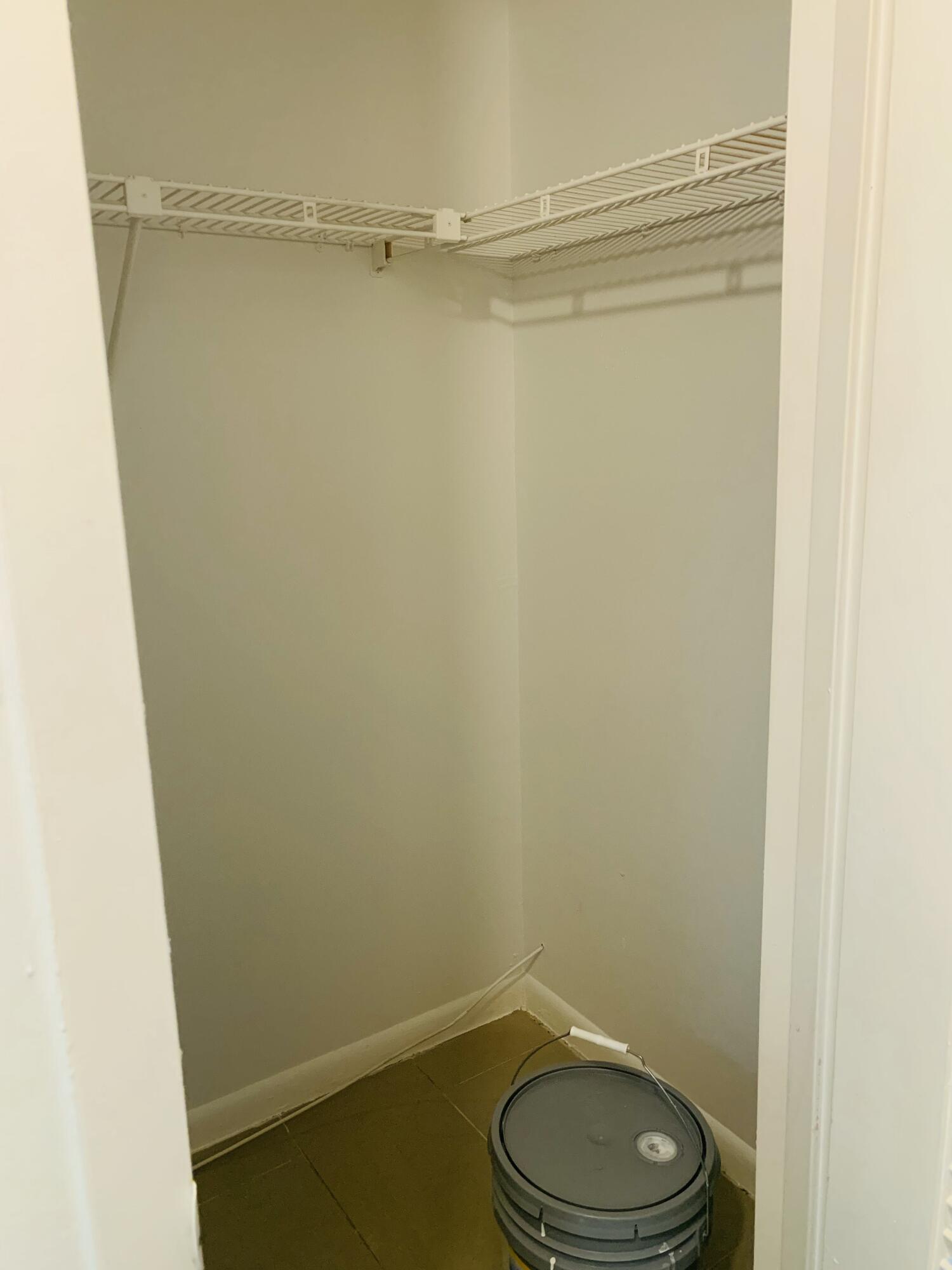 7 Suffolk A Boca Raton, FL 33434 - Photo 10 of 19 a bathroom with a toilet and a shower