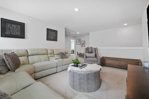 a living room with furniture and a couch