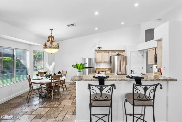 a bathroom with a bathtub and a window