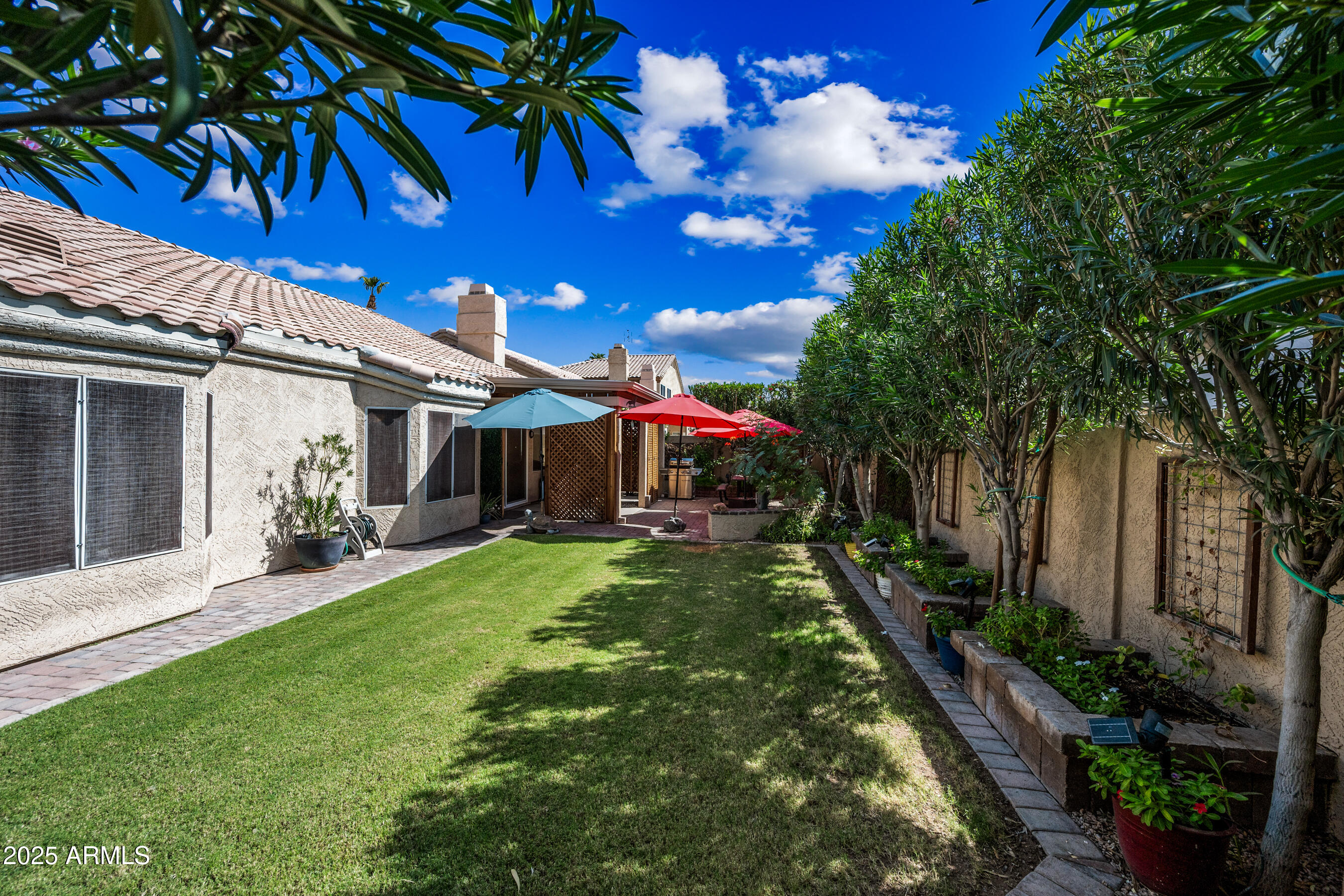 1541 West Chilton Avenue Gilbert, AZ 85233 - Photo 47 of 71 a view of a house with a yard