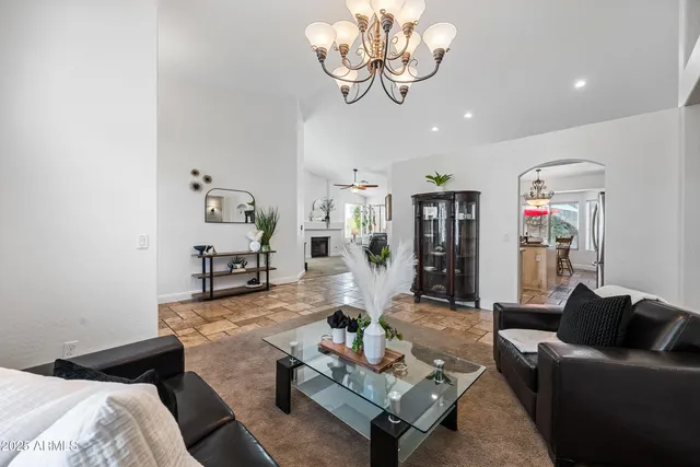 a view of a living room and floor to ceiling window