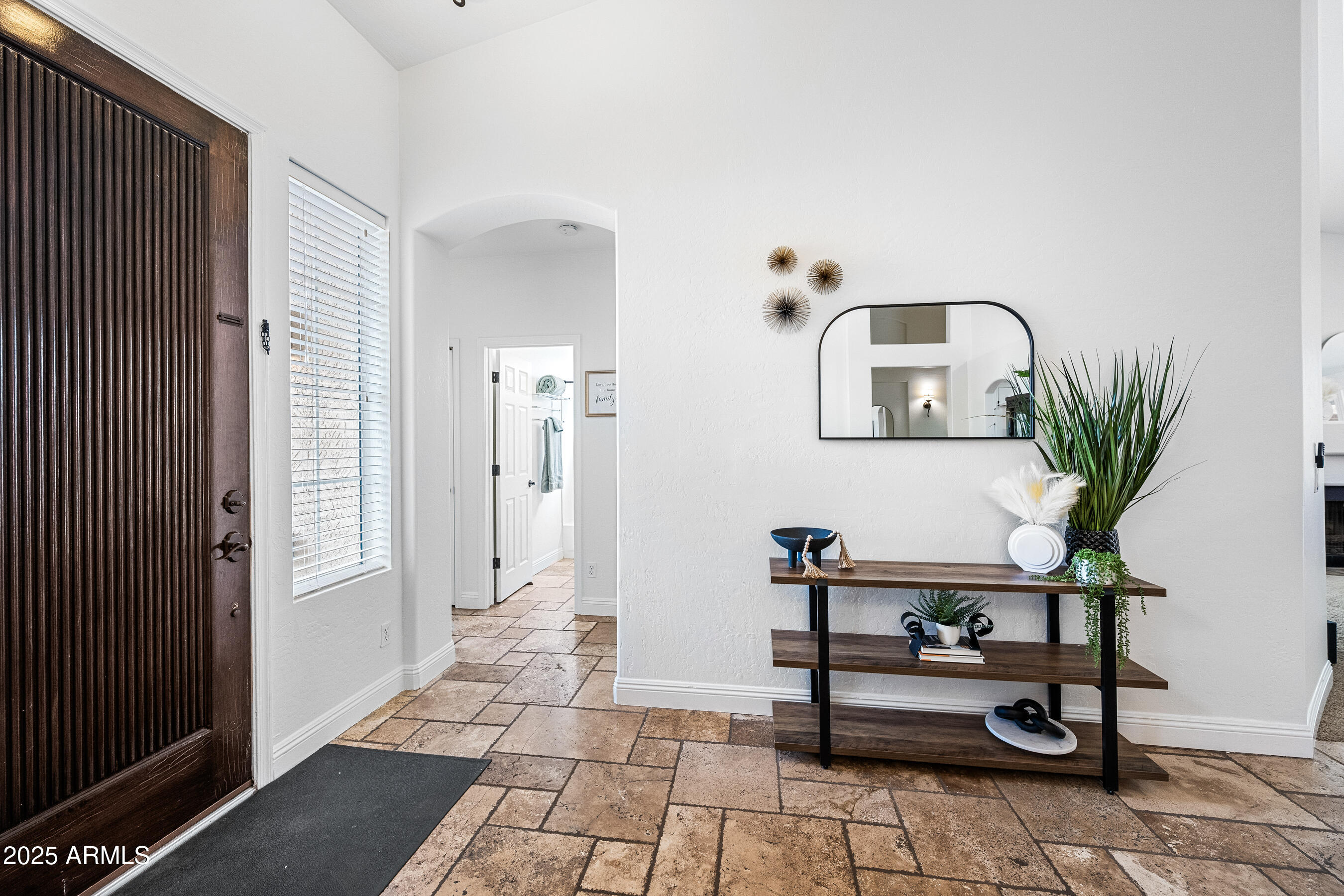 1541 West Chilton Avenue Gilbert, AZ 85233 - Photo 8 of 71 a view of a livingroom with furniture and a potted plant