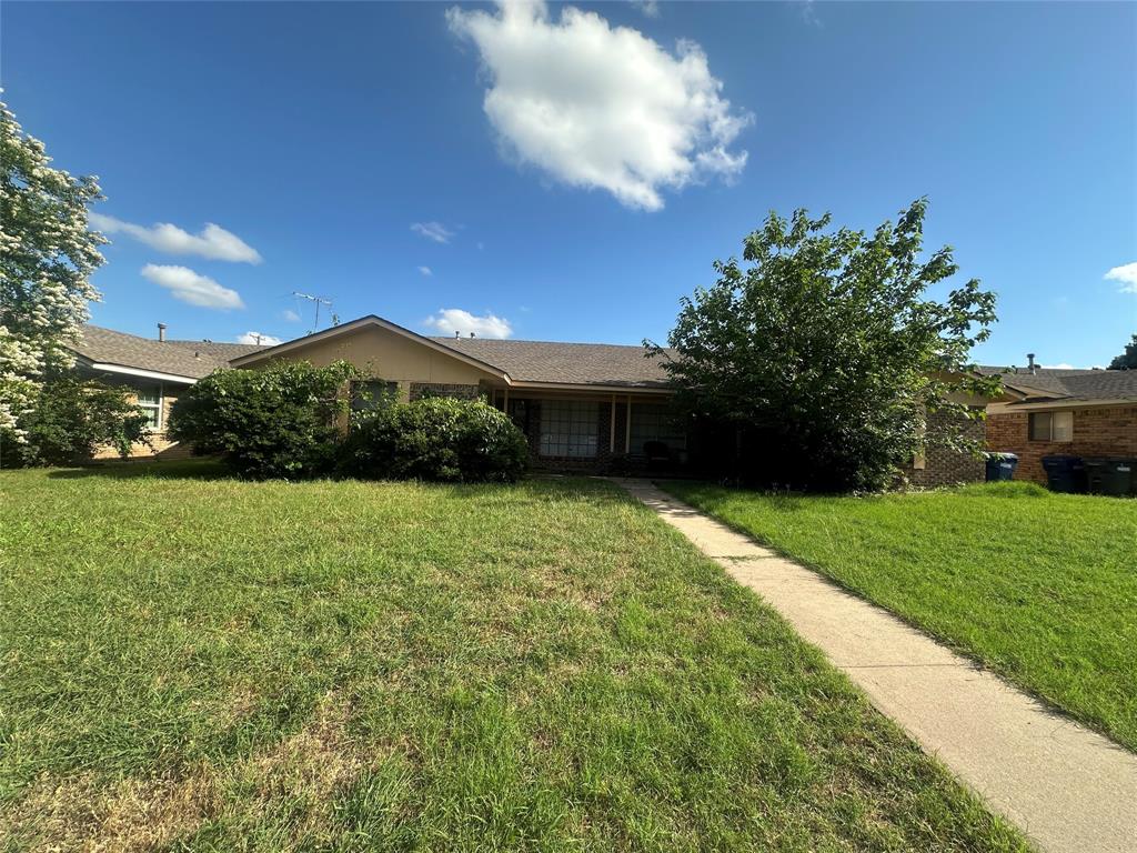 2109 Quail Run, Unit A McKinney, TX 75071 - Photo 1 of 16 a view of a house with a yard