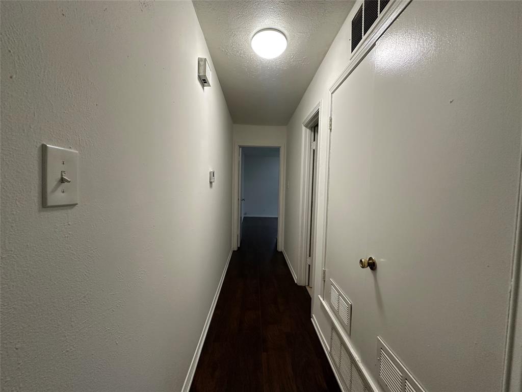2109 Quail Run, Unit A McKinney, TX 75071 - Photo 11 of 16 a view of a hallway