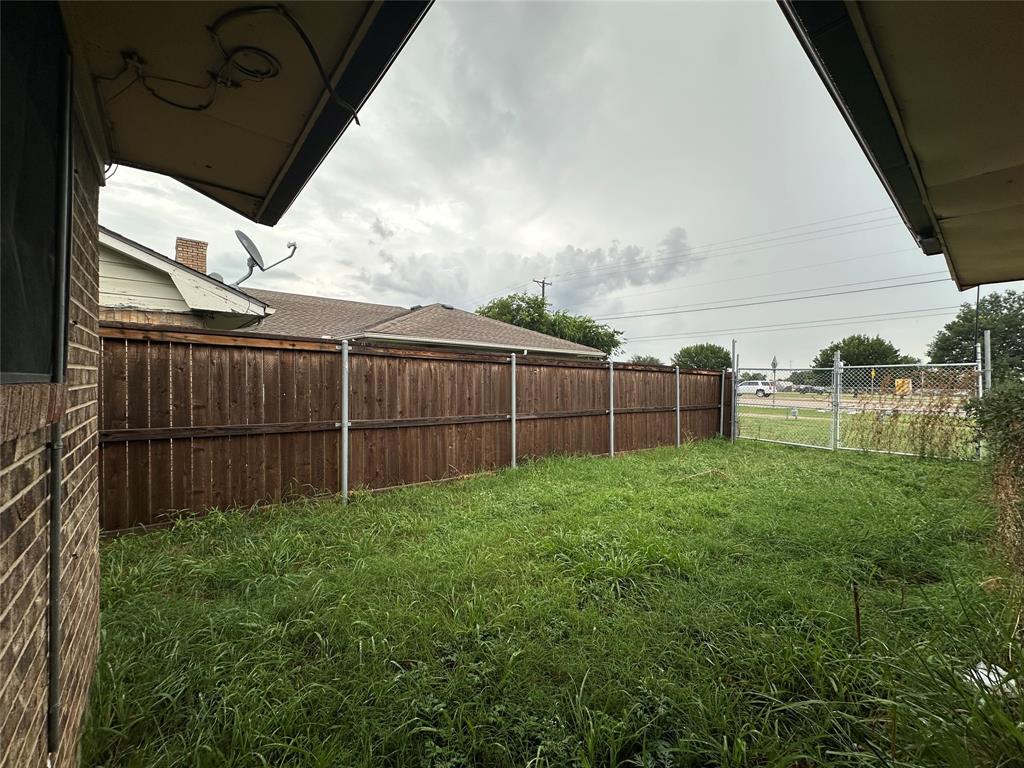 2109 Quail Run, Unit A McKinney, TX 75071 - Photo 15 of 16 a view of a backyard